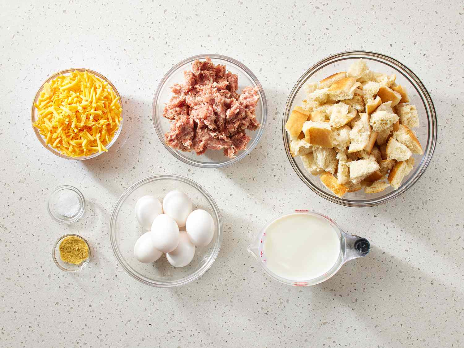 Easy Sausage Strata ingredients on a counter